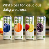 Four cans of 'Happy Being' white tea with fruit illustrations on a blurred natural background