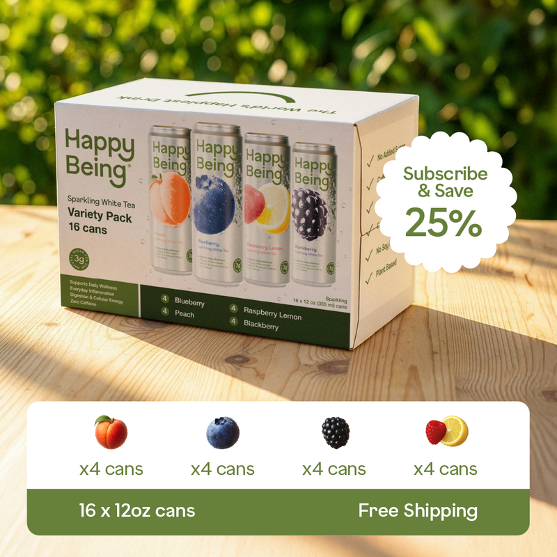 Happy Being sparkling white tea variety pack on a wooden surface with a blurred green background
