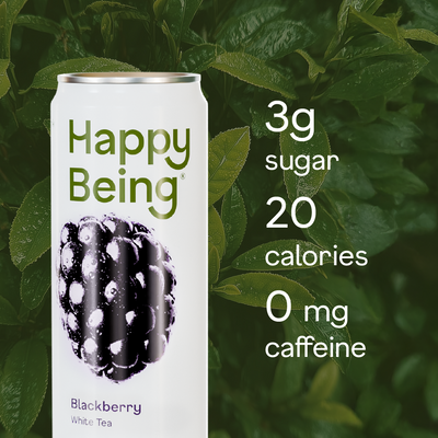 Can of 'Happy Being' Blackberry White Tea with nutritional information on a green leafy background