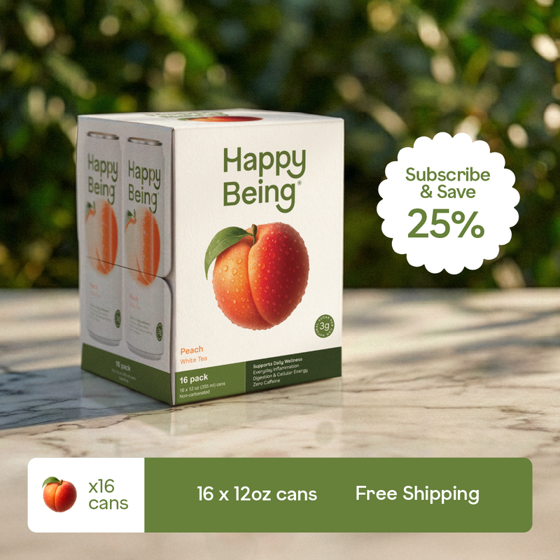 Box of Happy Being peach drinks with promotional text on a wooden surface