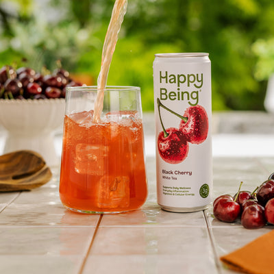 Happy Being black cherry drink poured over ice.
