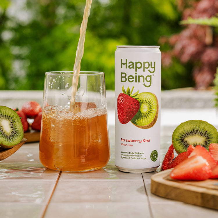 Happy Being strawberry kiwi drink poured over ice.