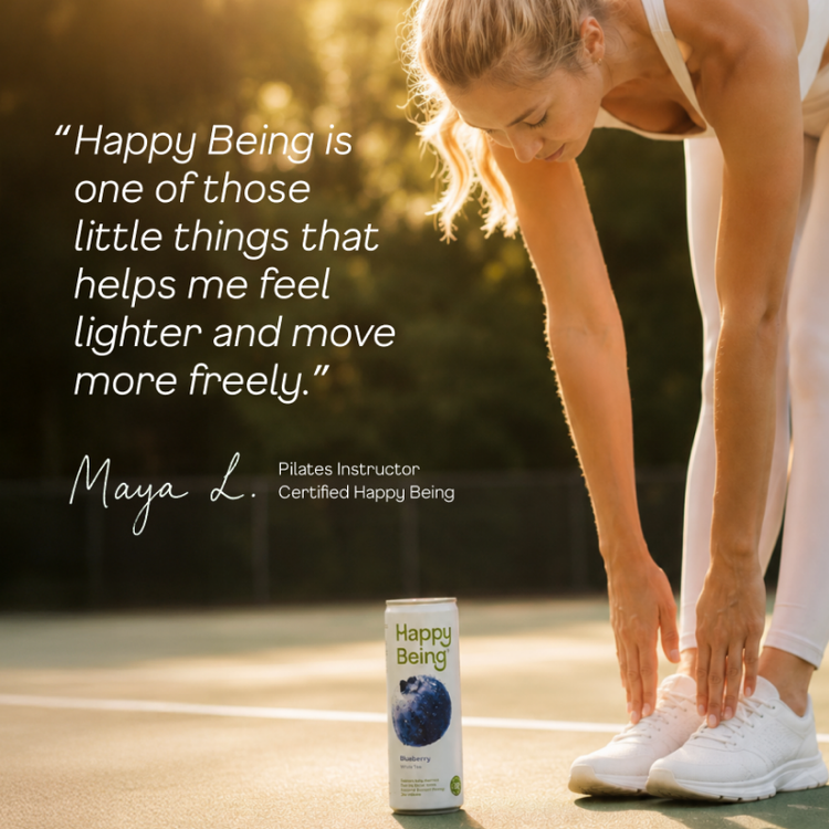 Pilates instructor Maya L. stretching, with a can of Happy Being Blueberry