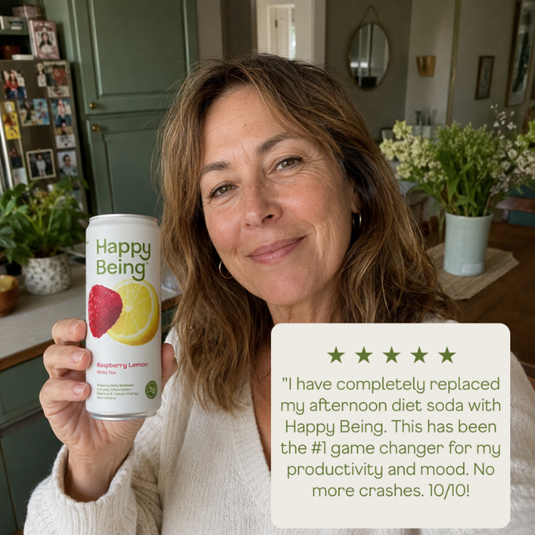 Customer in her kitchen holding Happy Being Raspberry Lemon