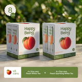 Two boxes of Happy Being tea on a table with a blurred green background