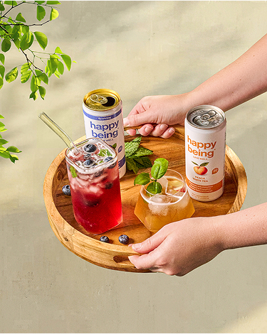 Happy Being Wellness Drink with interactive benefit hotspots